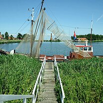 Fischerboot mit Reusen