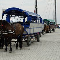 Pferdekutschen warten auf uns